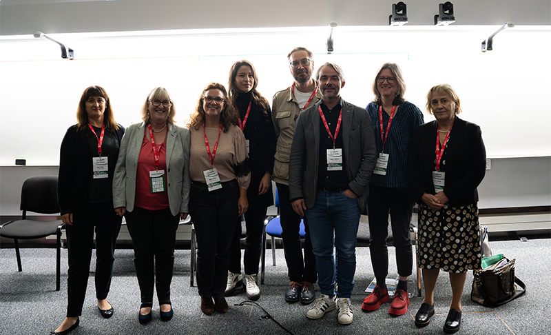 EAA Executive Board posing in a large room at EAA Belfast 2023 Annual Meeting