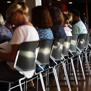 EAA conference participants sitting and listening to a lecture