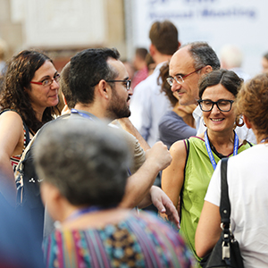 People standing and talking at an EAA conference
