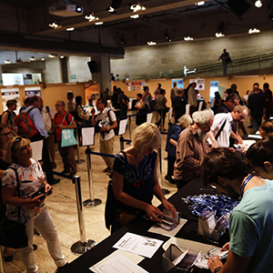 People registering at an EAA conference